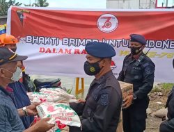 Brimob Polda Sumut Salurkan Bantuan Korban Banjir dan Bhakti Sosial di Kabupaten Sergei