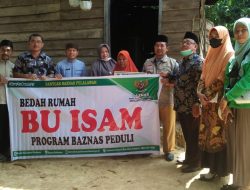 Badan Amil Zakat Nasional (BAZNAS) Kabupaten Pelalawan Serahkan Bantuan Bedah Rumah Di Kecamatan Ukui